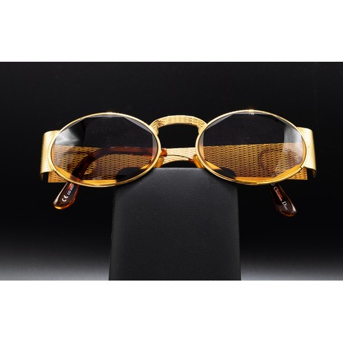 35 - CHRISTIAN DIOR VINTAGE SUNGLASSES, the sides are metal with the Christian Dior logo in polished gold... 