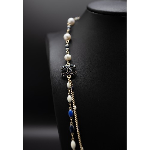 47 - CHANEL NECKLACE, silver tone chain, with pearl and beads of different shapes and tones of blue and w... 