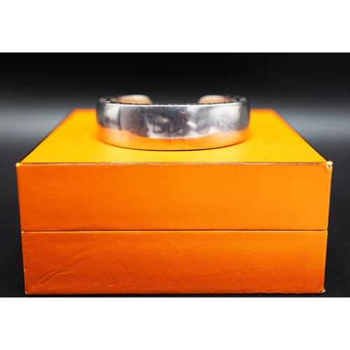 64 - HERMES CLARTE BANGLE, silver 925, with open H logo and box, 6.5cm L x 5.5cm W.