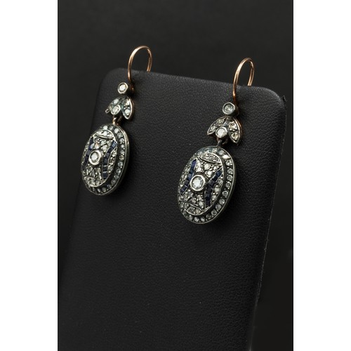 119 - YELLOW METAL AND SILVER TOPPED OVAL DROP EARRINGS SET, with eight cut and round brilliant cut diamon... 