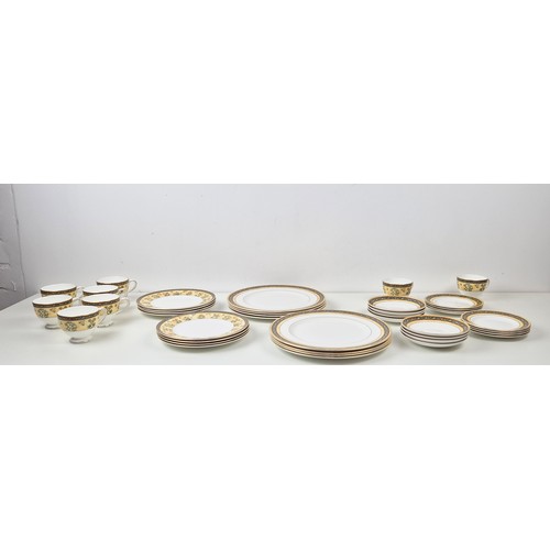 553 - PART DINNER SERVICE WEDGWOOD INDIA, comprising 8 dinner plates, 8 side plates, 8 small plates, 8 cup... 