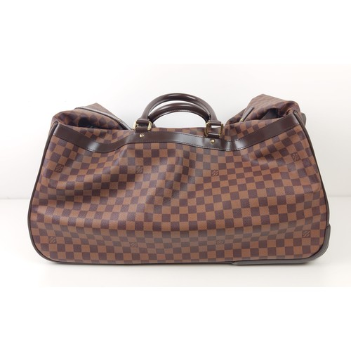 35A - LOUIS VUITTON EOLE ROLLING DUFFLE BAG, damier ebene coated canvas with fabric lining, top handles an... 