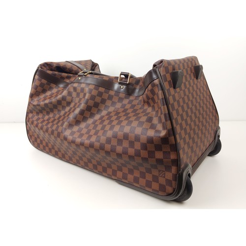 35A - LOUIS VUITTON EOLE ROLLING DUFFLE BAG, damier ebene coated canvas with fabric lining, top handles an... 