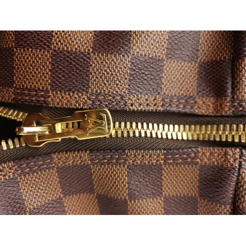 35A - LOUIS VUITTON EOLE ROLLING DUFFLE BAG, damier ebene coated canvas with fabric lining, top handles an... 