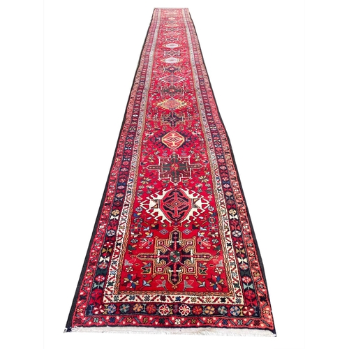 101 - NORTH WEST PERSIAN KARAJA LONG RUNNER, 770cm x 90cm.