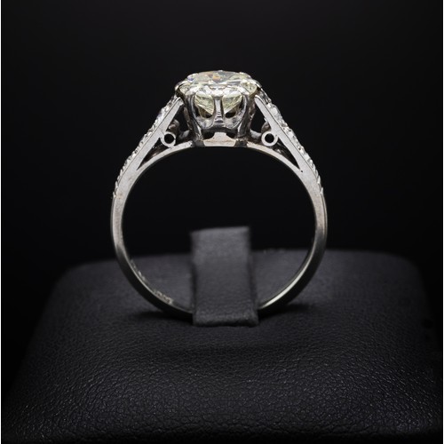 131 - AN 18CT WHITE GOLD AND PLATINUM SET DIAMOND SOLITAIRE RING, the round brilliant cut diamond of appro... 