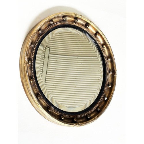 546 - WALL MIRROR, Regency style giltwood and gesso moulded, circular bevelled plate and moulded ball encr... 