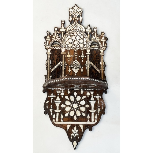 593 - SYRIAN WALL SHELF, 19th century hardwood and profusely bone and mother of pearl inset of architectur... 