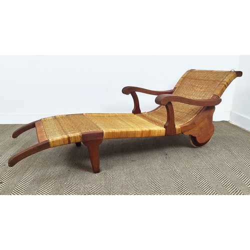 155 - LOUNGER, bears plaque 'Dryad', hardwood and caned, 178L x 61cm W.