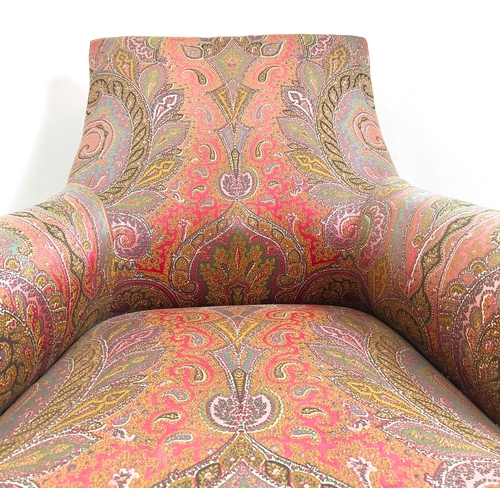 193 - ARMCHAIR, late 19th century French with paisley upholstery on turned ebonised supports, 83cm H x 88c... 