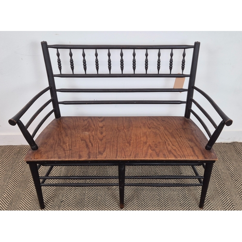 194 - WILLIAM MORRIS STYLE SUSSEX BENCH, ebonised and turned wooden frame with later seat and upholstered ... 