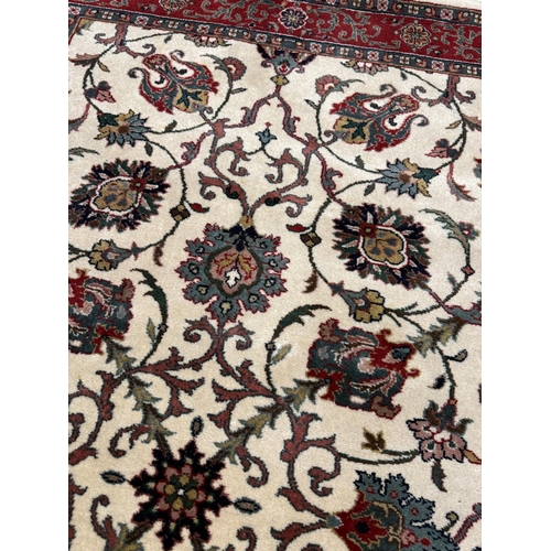 120 - TABRIZ DESIGN RUG, 152cm x 94cm.