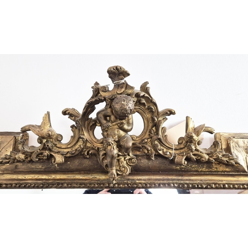 124 - WALL MIRROR, late 19th century French giltwood and gesso, shaped frame with cherub and bird crest, 1... 