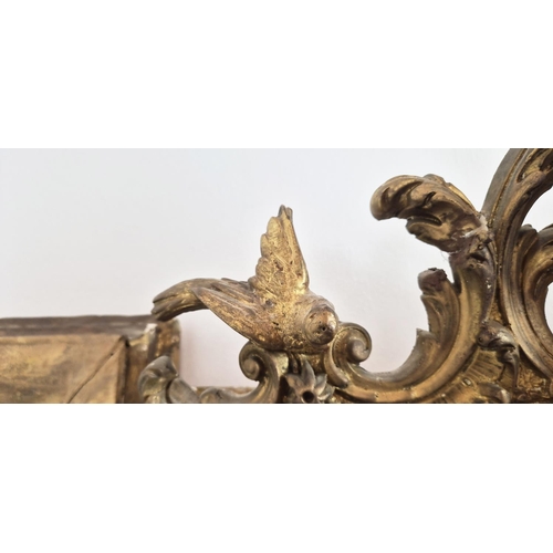 124 - WALL MIRROR, late 19th century French giltwood and gesso, shaped frame with cherub and bird crest, 1... 