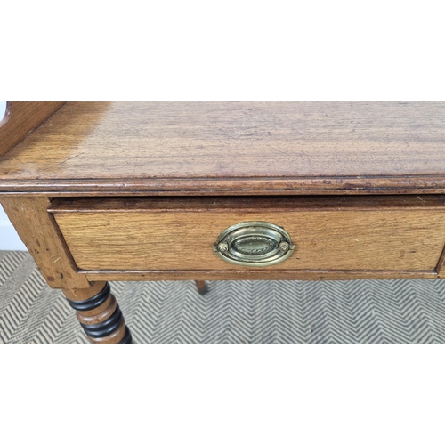 145 - WRITING TABLE, George IV mahogany and ebonised with three quarter gallery top over three frieze draw... 