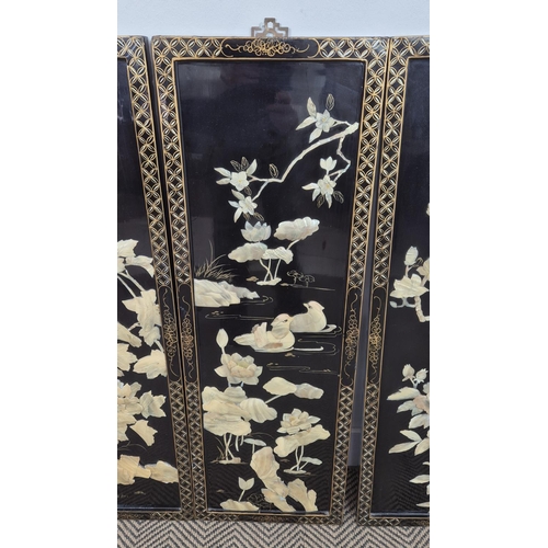 481 - PANELS, a set of four, Chinese black lacquer with applied low relief decoration, 92cm H x 31cm W. (4... 