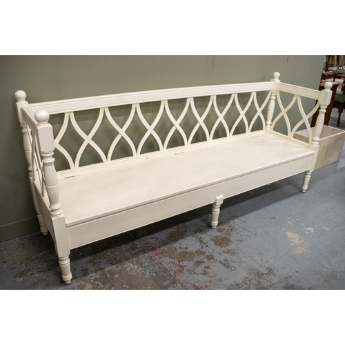 495 - BENCH, white painted with hinged seat, 98cm H x 220cm W x 58cm D.