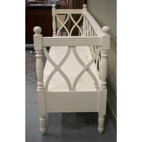 495 - BENCH, white painted with hinged seat, 98cm H x 220cm W x 58cm D.