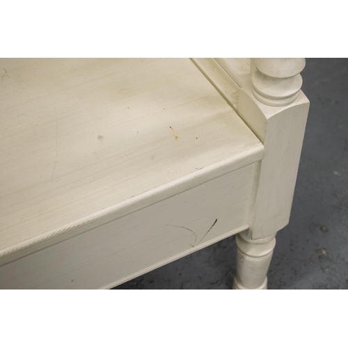 495 - BENCH, white painted with hinged seat, 98cm H x 220cm W x 58cm D.