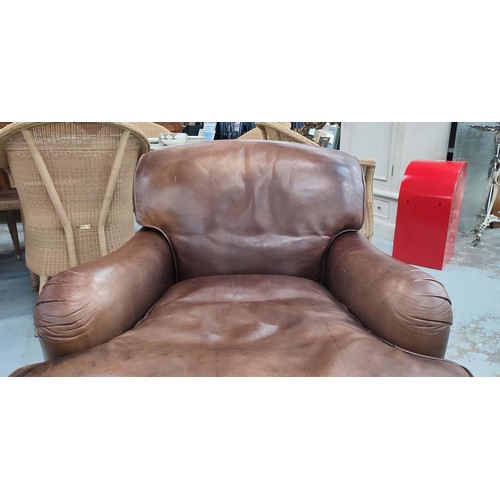 195 - ARMCHAIRS, a pair, Howard style brown leather, each 85cm W x 81cm H x 105cm D. (2)