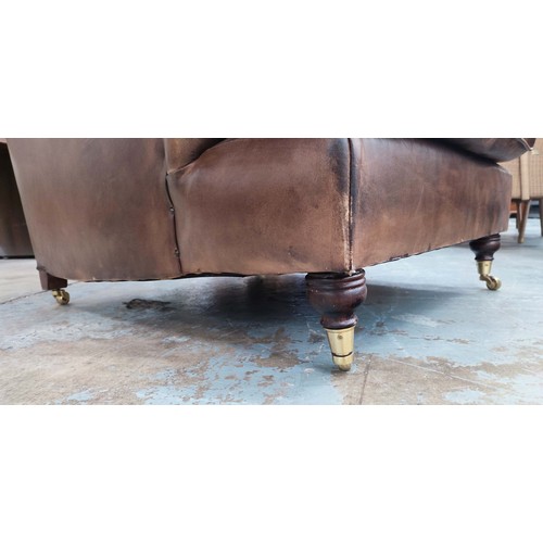 195 - ARMCHAIRS, a pair, Howard style brown leather, each 85cm W x 81cm H x 105cm D. (2)