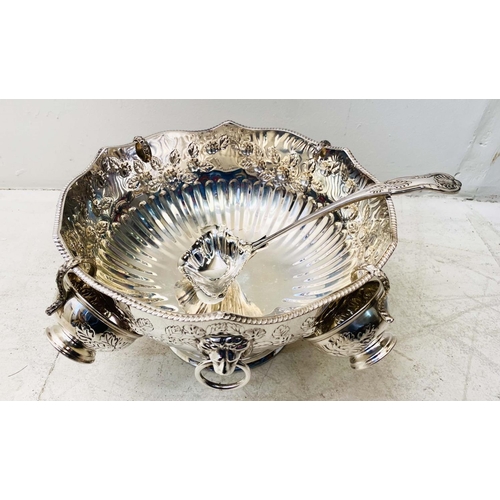 613 - PUNCH BOWL, Regency style polished metal, with four cups and ladle, 19cm H x 33cm W (5)