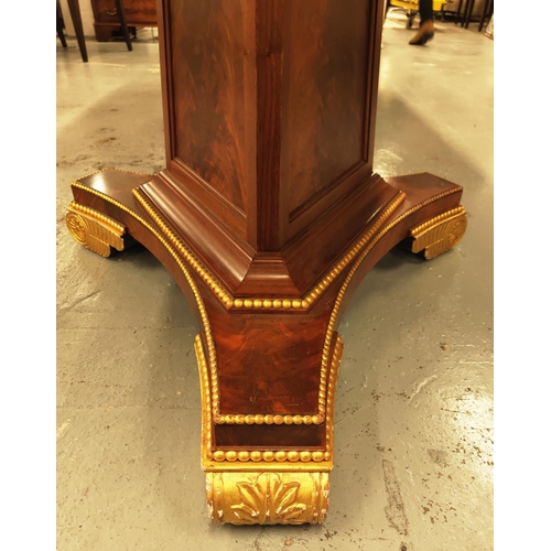 123 - DINING TABLE, Regency style mahogany with gilt details on triform pedestal bases, 76cm H x 236cm L x... 