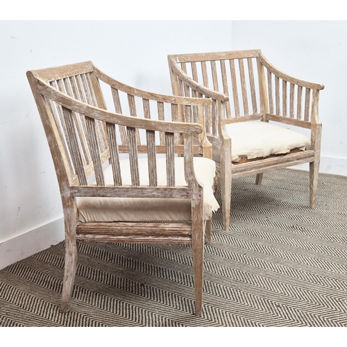 204 - CONSERVATORY ARMCHAIRS, a pair, in pine, in a stripped finish, each 61cm W x 85cm D x 53cm. (2)