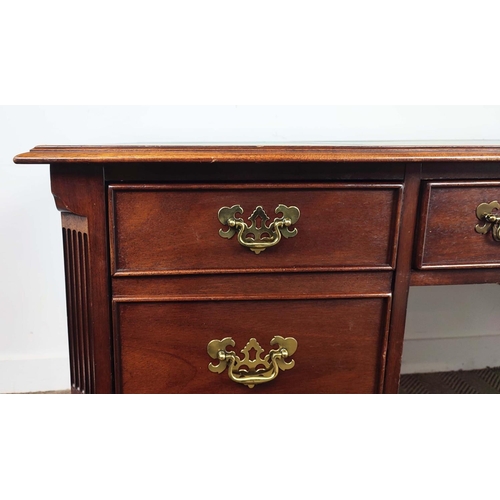 497 - SLIGH MICHIGAN DESK, Georgian style mahogany with green leather top above four drawers, 77cm H x 150... 