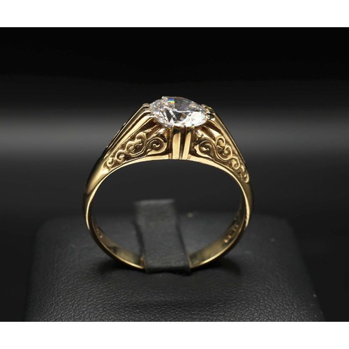 30 - 9CT YELLOW GOLD RING GENT'S STYLE SET, with a large round cubic zirconia, with patterned shoulders.