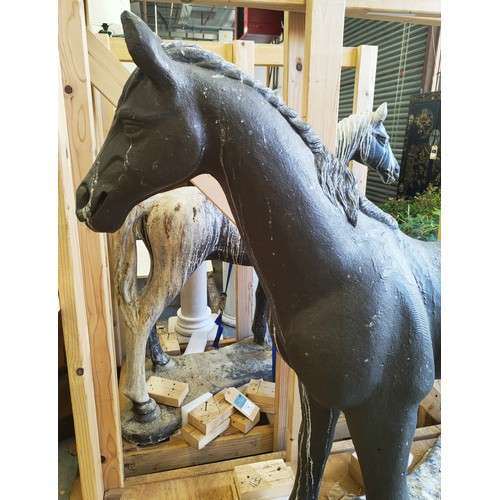 79 - DAVID BROOKES SCULPTURES, a pair of Horses, concrete, part of an exhibition at the Saatchi Gallery, ... 