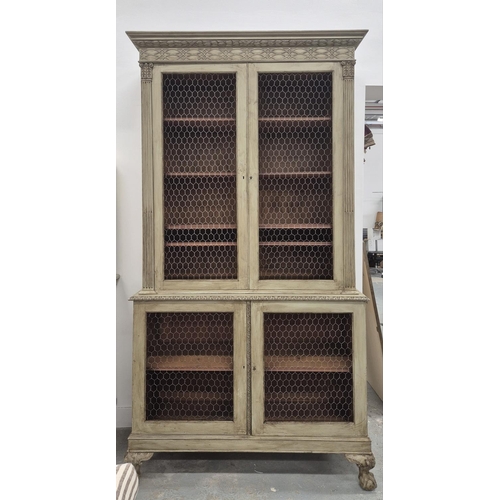 128 - BOOKCASE, 19th century grey painted with four chicken wire doors, the top with adjustable shelves on... 