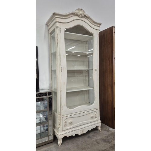 173 - DISPLAY CABINET, French style with a distressed white painted finish, 95cm W x 45cm D x 218cm H.