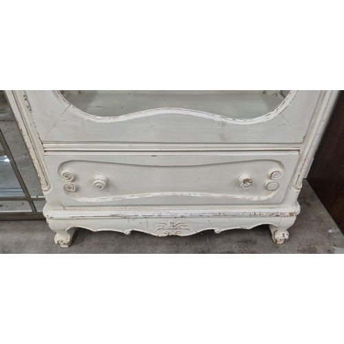 173 - DISPLAY CABINET, French style with a distressed white painted finish, 95cm W x 45cm D x 218cm H.