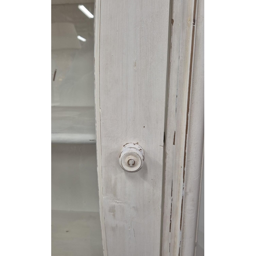 173 - DISPLAY CABINET, French style with a distressed white painted finish, 95cm W x 45cm D x 218cm H.