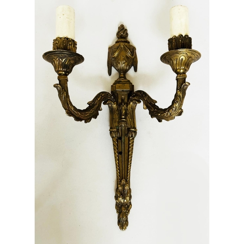 184 - WALL LIGHTS, two pairs, gilt metal each with two candelabra together with a shield back two-branch c... 