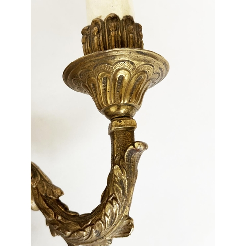 184 - WALL LIGHTS, two pairs, gilt metal each with two candelabra together with a shield back two-branch c... 