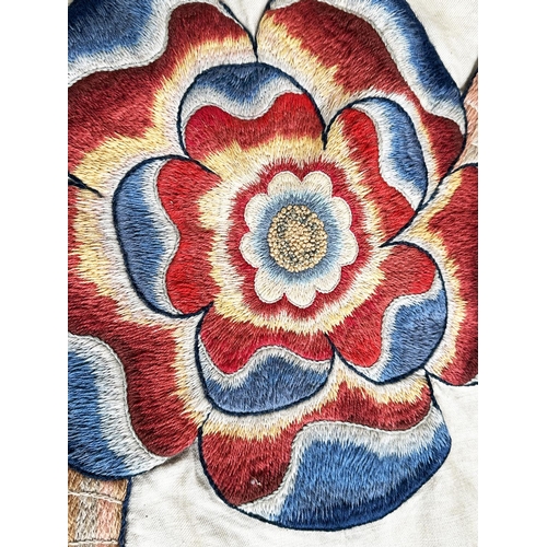 186 - WALL HANGING, 19th century canvas and lined incorporating deeply embroidered floral and foliated mot... 