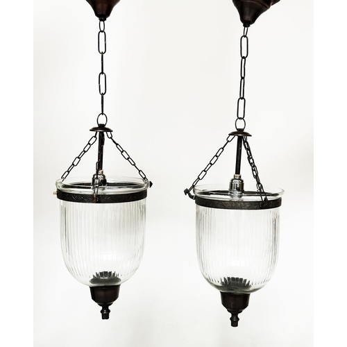 206 - BELL JAR HALL LANTERNS, a pair, reeded bell jar glass with bronze style mounts, approx 64cm H. (2)