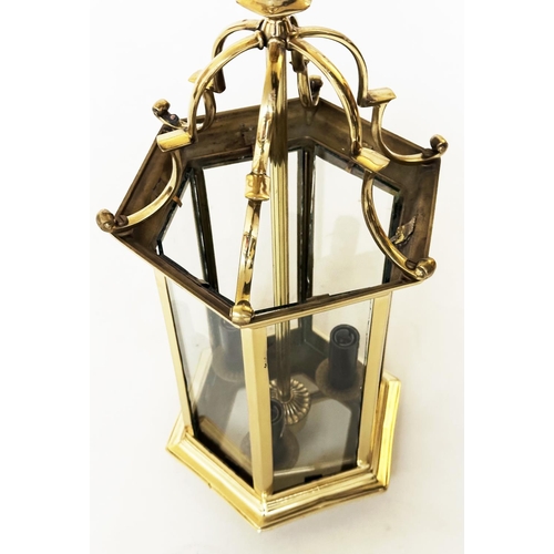 213 - HALL LANTERN, Georgian style gilt metal, hexagonal and glazed, 52cm H.