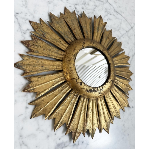 215 - STARBURST WALL MIRROR, circular plate with gilt metal starburst frame, 40cm W.