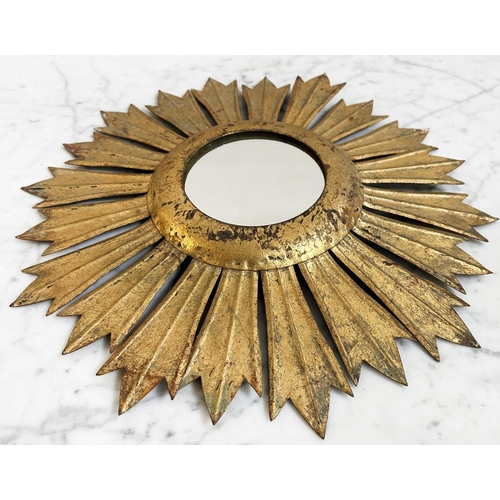 215 - STARBURST WALL MIRROR, circular plate with gilt metal starburst frame, 40cm W.