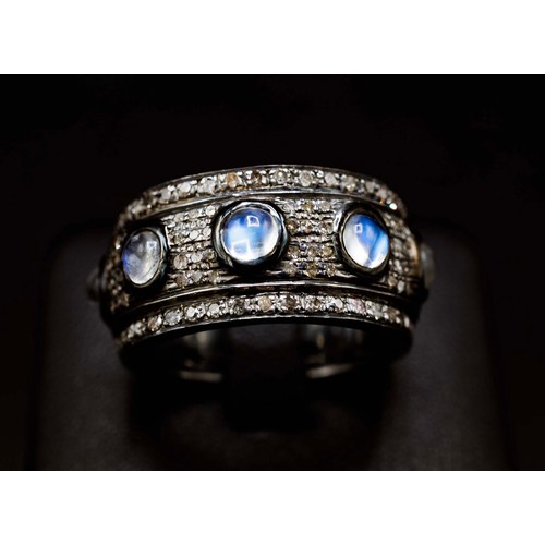 19 - WEIGHTY SILVER FULL ETERNITY BAND SET, with cabochon moonstones and rose-cut diamonds, moonstones 2.... 