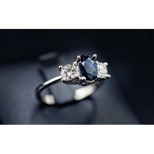 23 - 18CT WHITE GOLD OVAL-CUT SAPPHIRE AND RBC DIAMOND TRILOGY RING, sapphire 0.85ct approx, diamonds 0.4... 