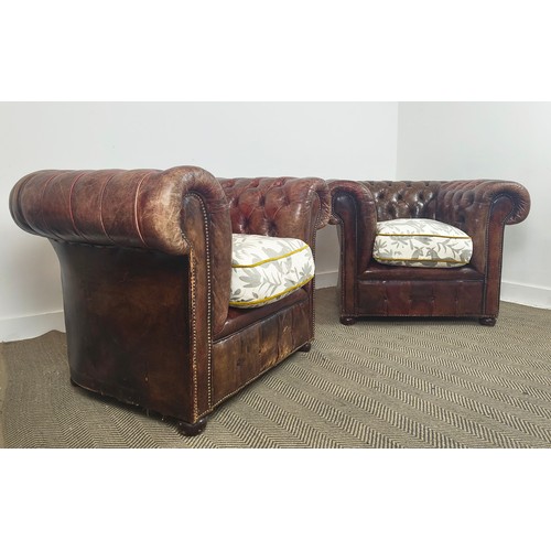 480 - ARMCHAIRS, a pair, Chesterfield design, leather upholstered, patterned fabric upholstered seats, 110... 