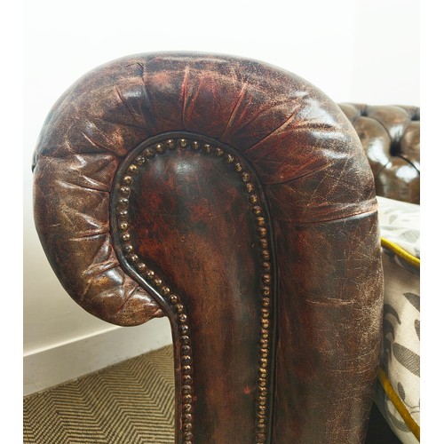 480 - ARMCHAIRS, a pair, Chesterfield design, leather upholstered, patterned fabric upholstered seats, 110... 