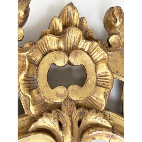 274 - WALL MIRROR, 19th century Italian giltwood with C scroll cartouche frame, 64cm H x 40cm.