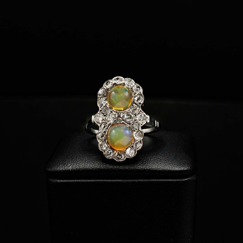 40 - CERTIFICATED UNUSUAL 18CT WHITE GOLD VICTORIAN RING SET, with two cabochon opals and several old Eur... 