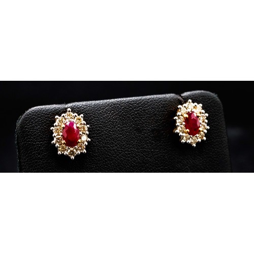 61 - PAIR OF 9CT YELLOW AND WHITE GOLD OVAL RUBY AND RBC DIAMOND CLUSTER STUDS, boxed, rubies 1.43ct, dia... 