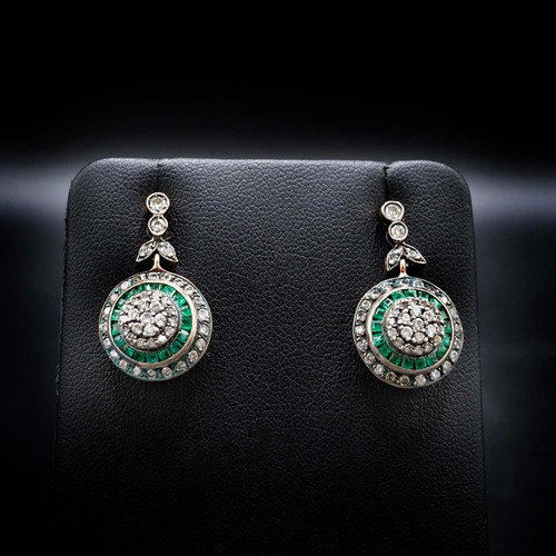 64 - A PAIR OF EMERALD AND DIAMOND PENDANT EARRINGS, rose yellow metal backs, each with a cluster of diam... 